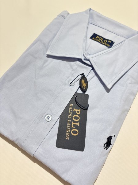 قميص بولو باللون الازرق سيمل كحلي